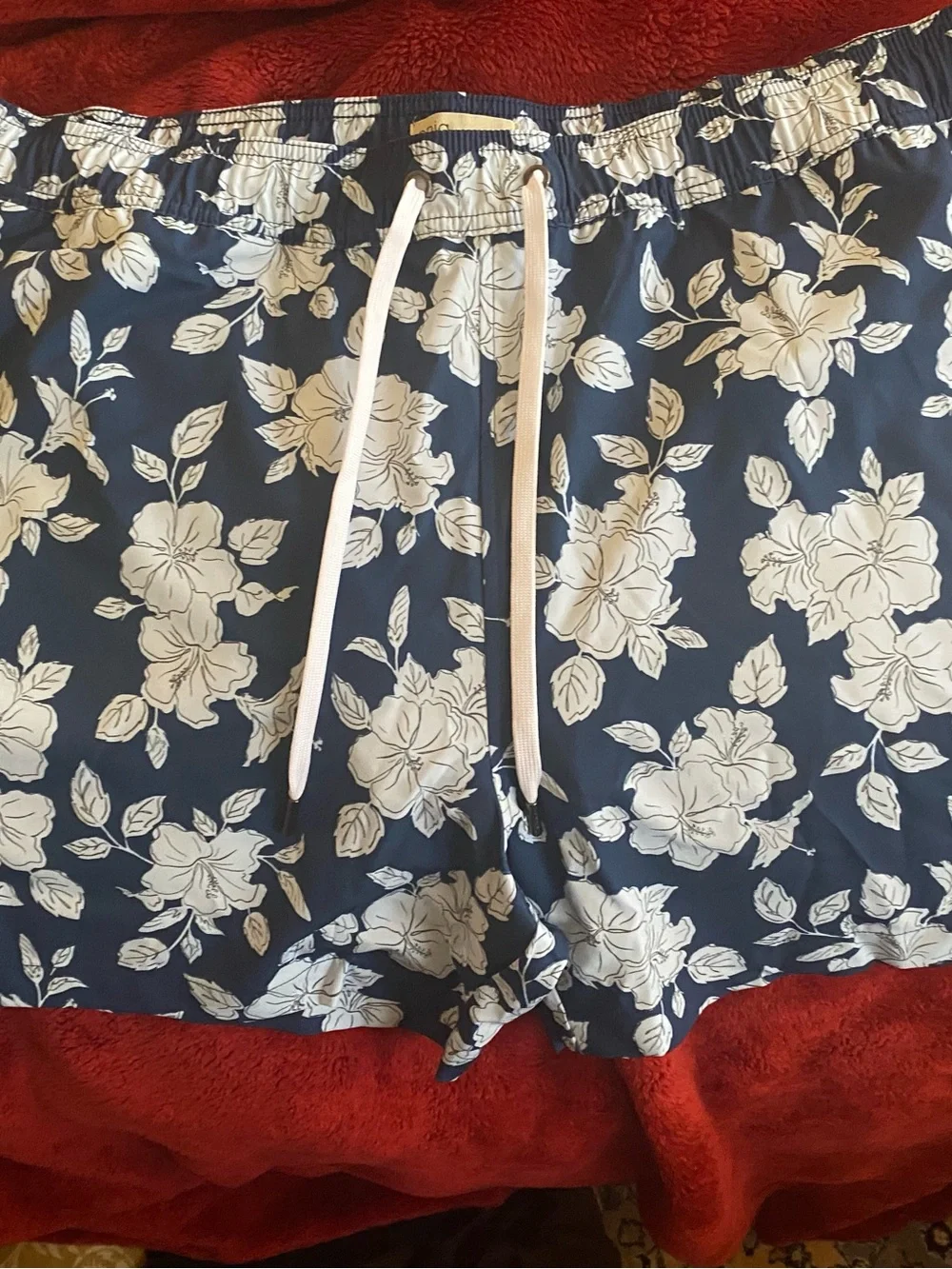 Onia Navy Swim Trunks with White Floral Print. Size XXL